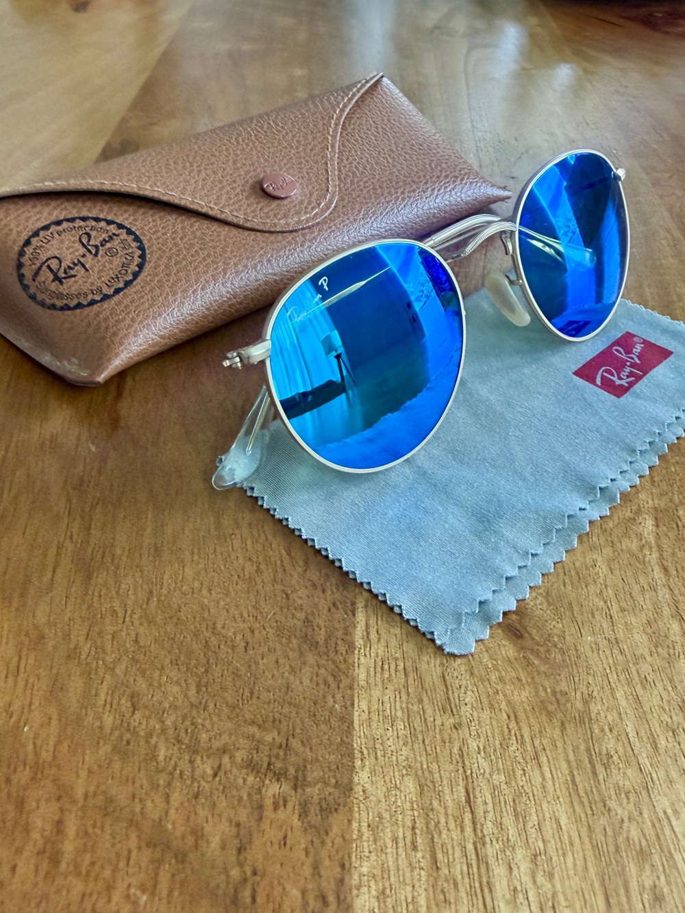 Ray-Ban 50mm Round Gold Frame Sunglasses with Polarized Blue Mirror Lenses